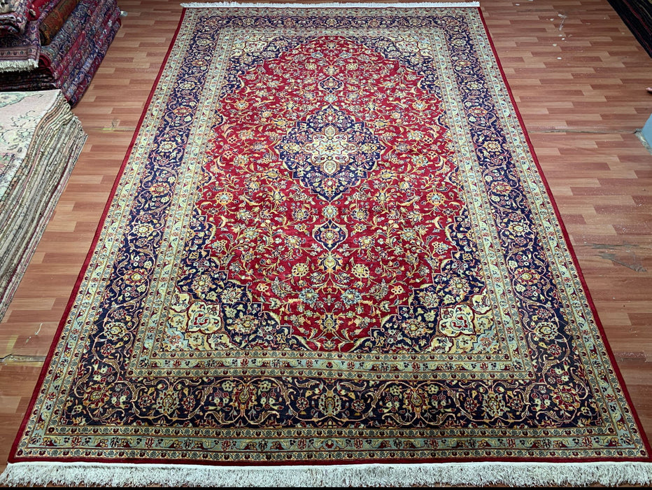 9’6” × 13’10” Hand-Knotted Persian Wool Rug – Red Field with Navy & Ivory Floral Border