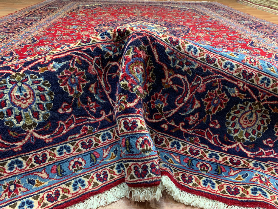 9’6” × 13’11” Hand-Knotted Wool Persian Rug – Red with Navy Border & Central Medallion