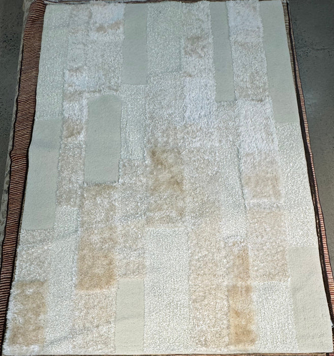 5'x8' Cream Hand Tufted Shaggy Area Rug