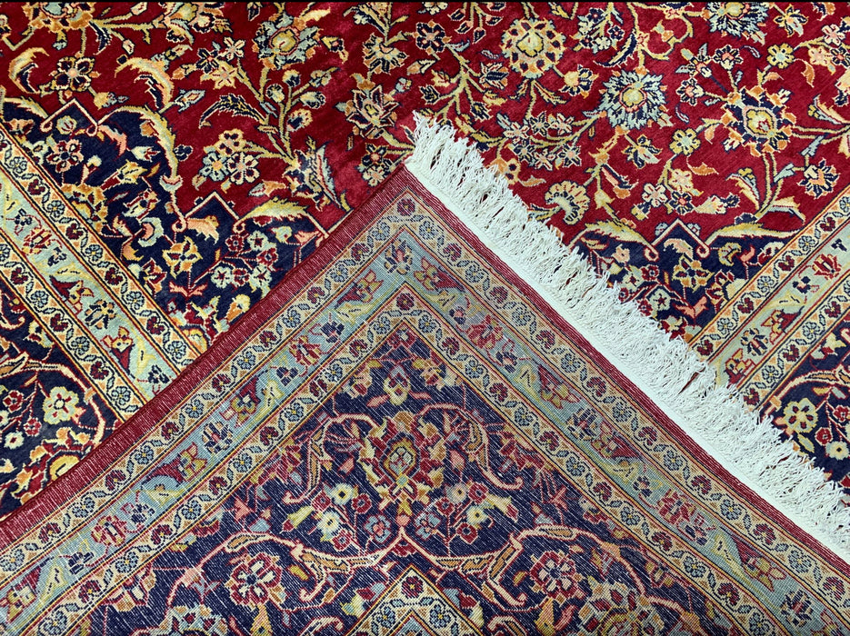 9’6” × 13’10” Hand-Knotted Persian Wool Rug – Red Field with Navy & Ivory Floral Border