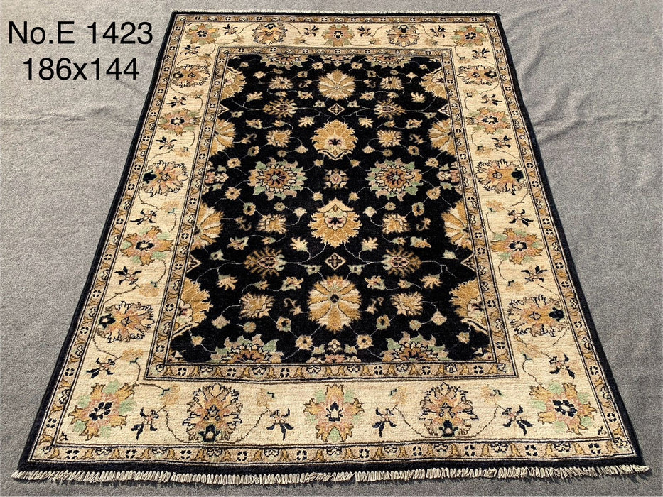 4’9” x 6’11” Hand-Knotted Chobi Rug