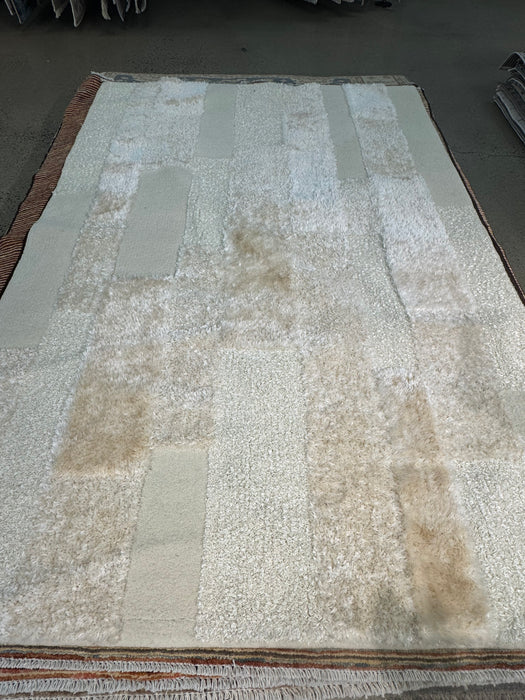5'x8' Cream Hand Tufted Shaggy Area Rug