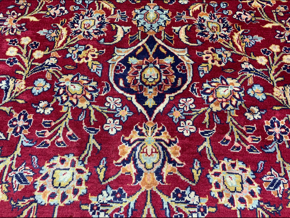 9’6” × 13’10” Hand-Knotted Persian Wool Rug – Red Field with Navy & Ivory Floral Border