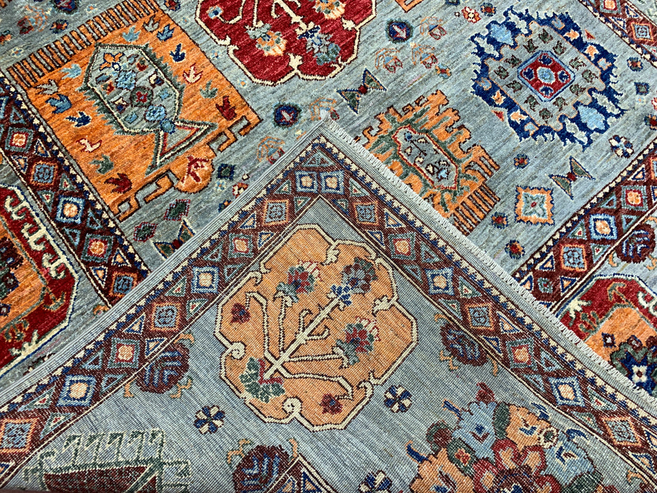 6'3" x 9'7" Hand-Knotted Kazak Wool Rug – Aqua Blue with Multicolor Tribal Motifs