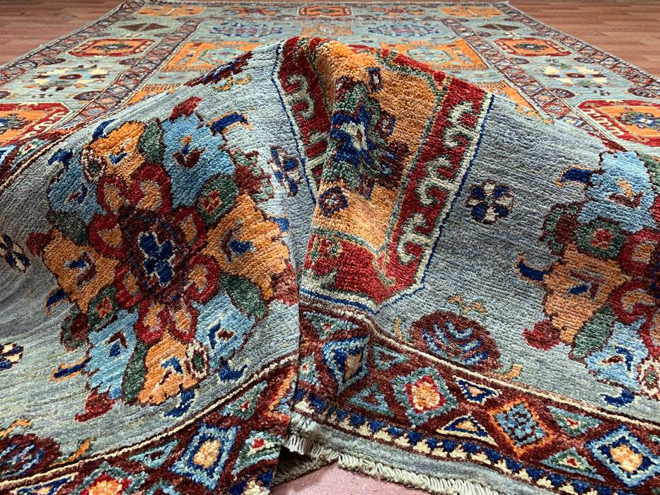 6'3" x 9'7" Hand-Knotted Kazak Wool Rug – Aqua Blue with Multicolor Tribal Motifs