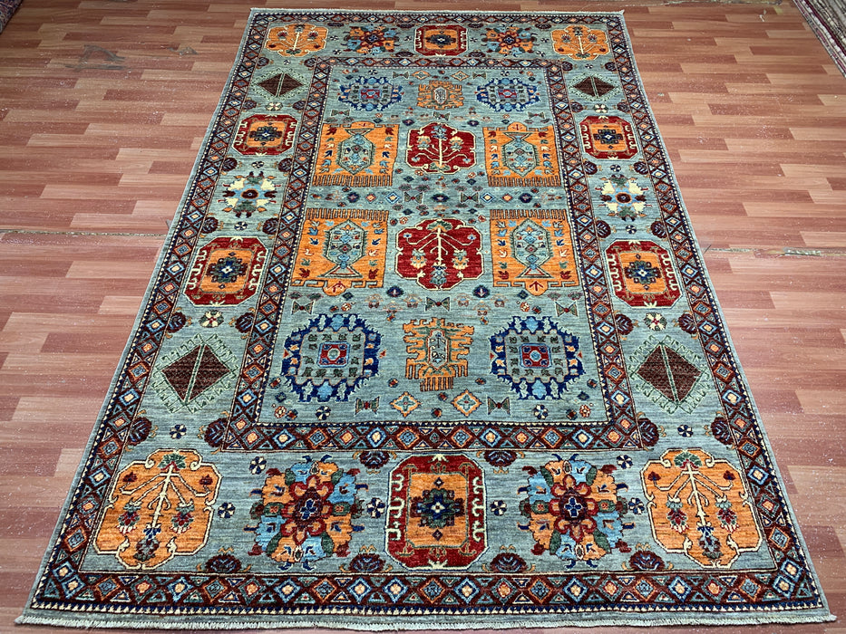 6'3" x 9'7" Hand-Knotted Kazak Wool Rug – Aqua Blue with Multicolor Tribal Motifs