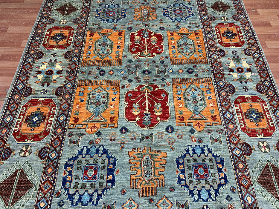 6'3" x 9'7" Hand-Knotted Kazak Wool Rug – Aqua Blue with Multicolor Tribal Motifs