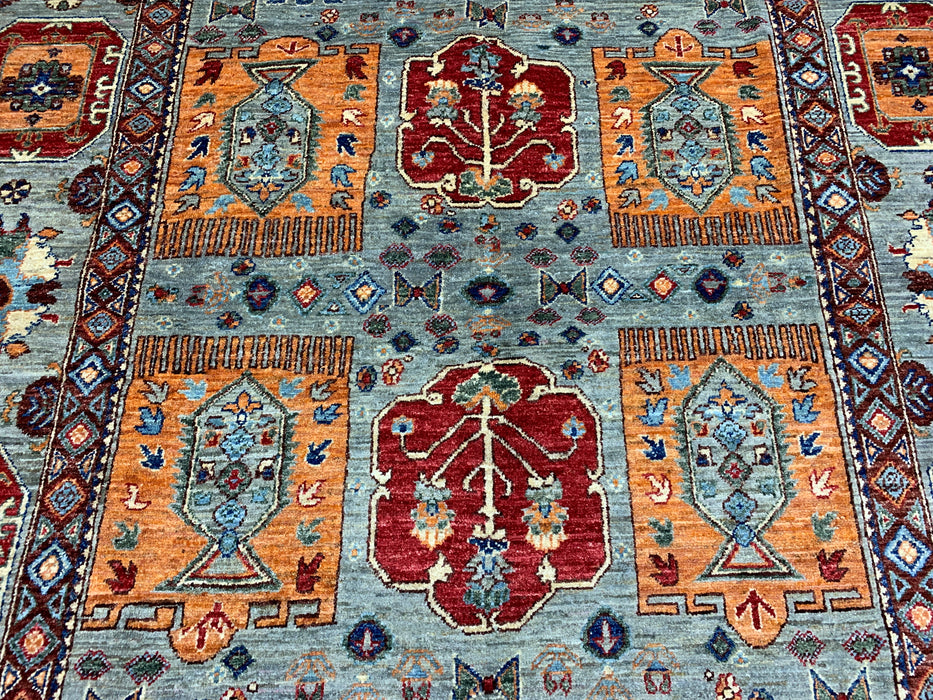 6'3" x 9'7" Hand-Knotted Kazak Wool Rug – Aqua Blue with Multicolor Tribal Motifs
