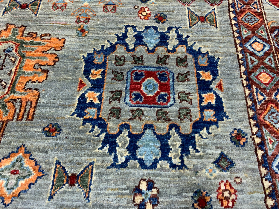 6'3" x 9'7" Hand-Knotted Kazak Wool Rug – Aqua Blue with Multicolor Tribal Motifs