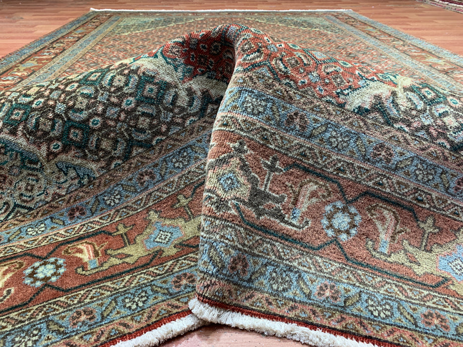 6’5” × 9’4” Hand-Knotted Wool Rug – Rust Red with Teal Diamond Medallion & Animal Border