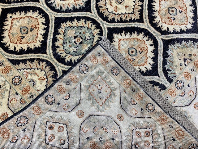 7'x10' Hand-Knotted Wool Rug – Black Field with Ivory/Beige Border
