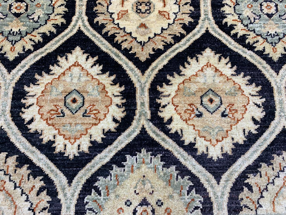 7'x10' Hand-Knotted Wool Rug – Black Field with Ivory/Beige Border