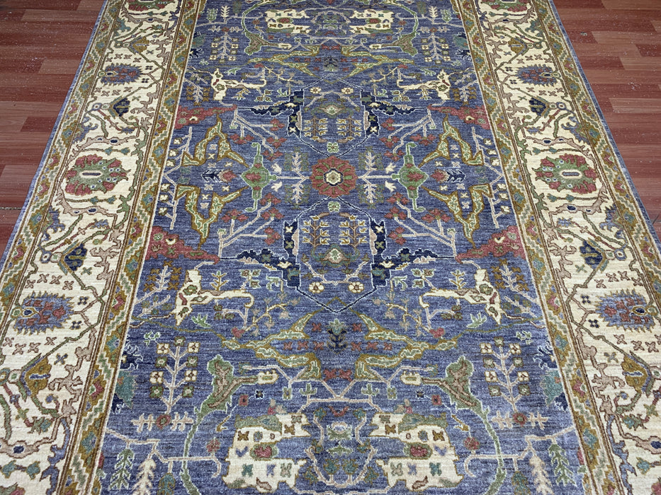 7'x10' Hand-Knotted Chobi Wool Rug – Blue Field & Ivory Border