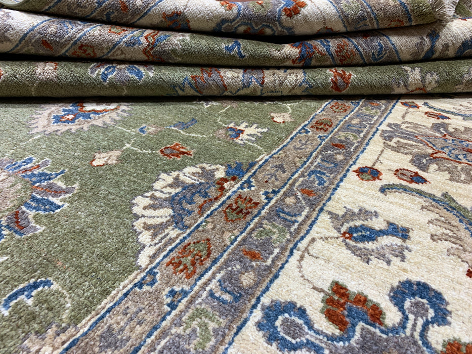 6'5" × 9'5" Hand-Knotted Chobi Wool Rug – Green Field & Ivory Border