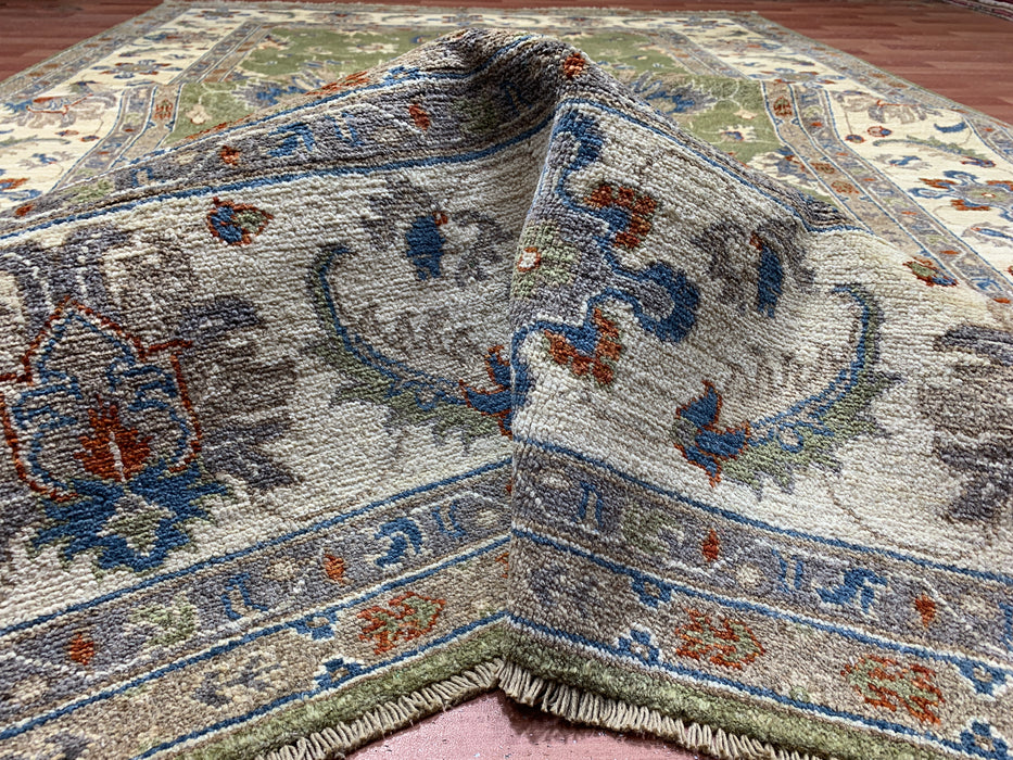 6'5" × 9'5" Hand-Knotted Chobi Wool Rug – Green Field & Ivory Border