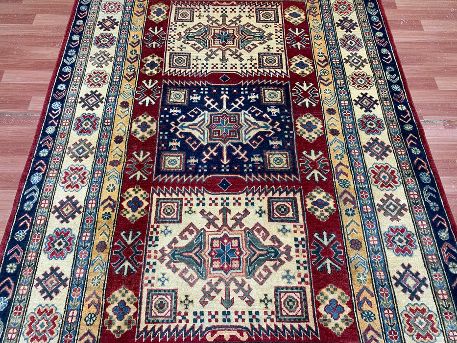 5'4" × 7'11" Hand-Knotted Kazak Wool Rug – Ivory, Red & Navy Geometric Design
