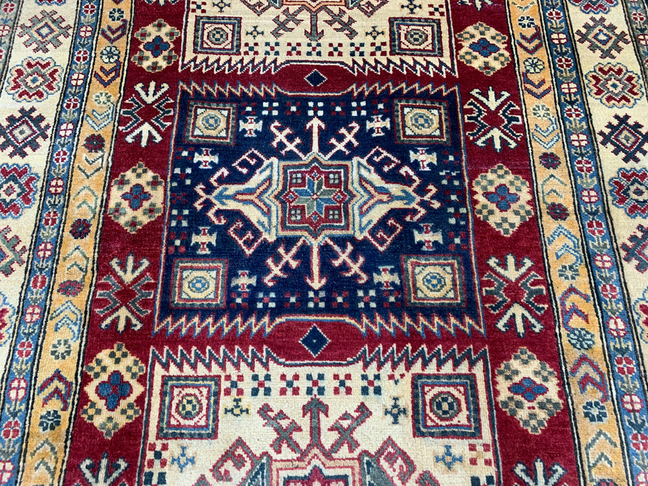 5'4" × 7'11" Hand-Knotted Kazak Wool Rug – Ivory, Red & Navy Geometric Design