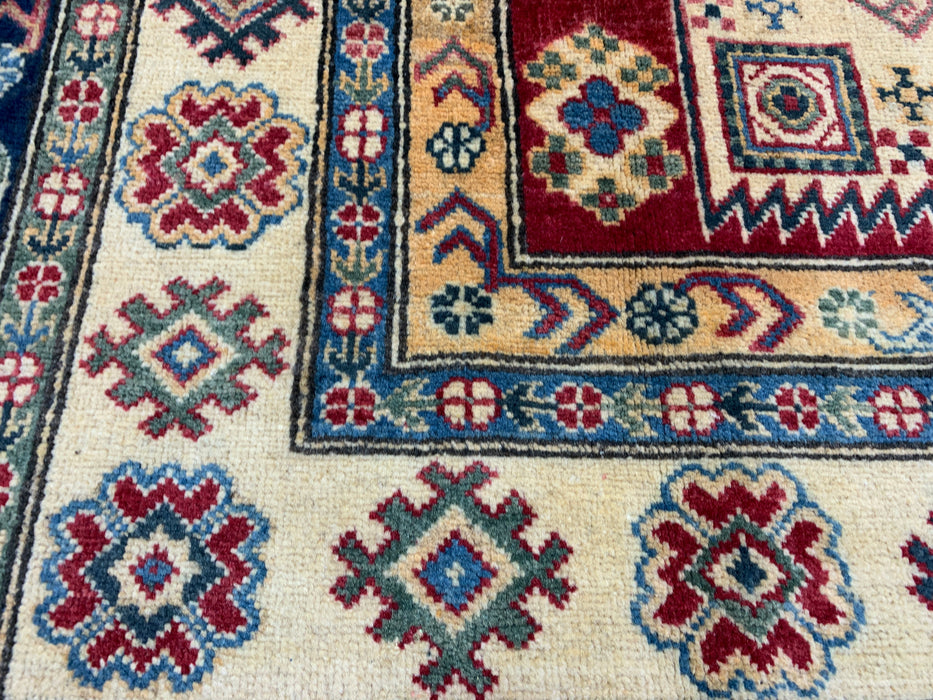 5'4" × 7'11" Hand-Knotted Kazak Wool Rug – Ivory, Red & Navy Geometric Design