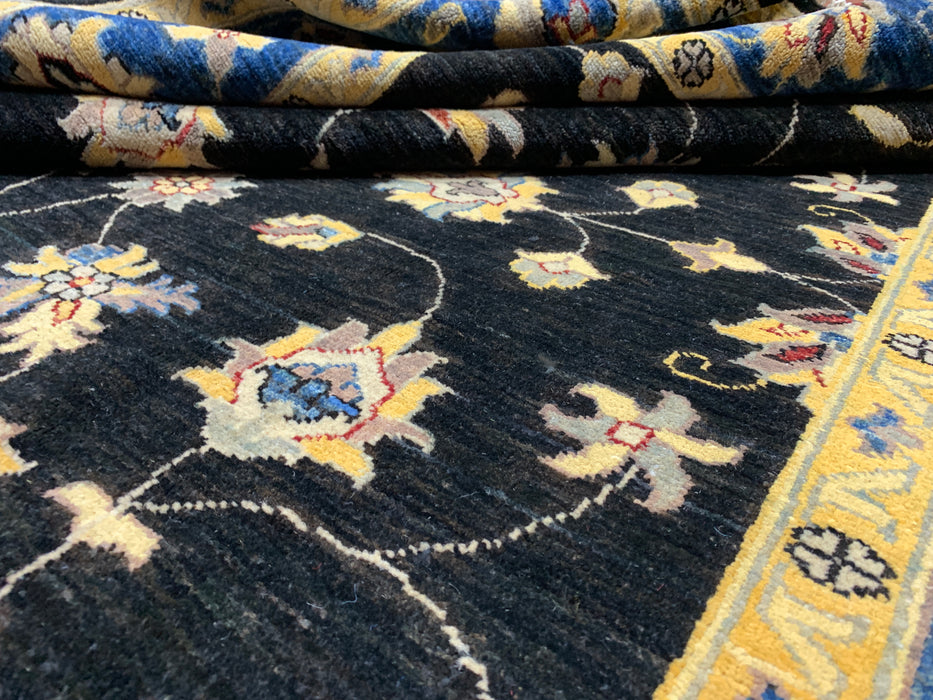 5'7" × 7'8" Hand-Knotted Wool Rug – Black Field with Blue & Gold Floral Border