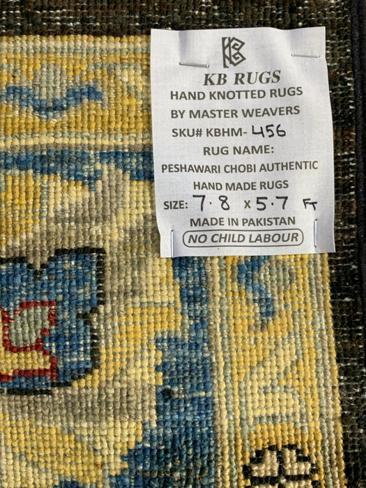 5'7" × 7'8" Hand-Knotted Wool Rug – Black Field with Blue & Gold Floral Border