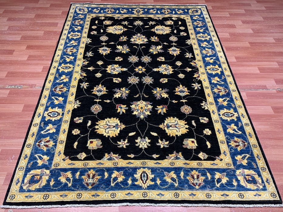 5'7" × 7'8" Hand-Knotted Wool Rug – Black Field with Blue & Gold Floral Border