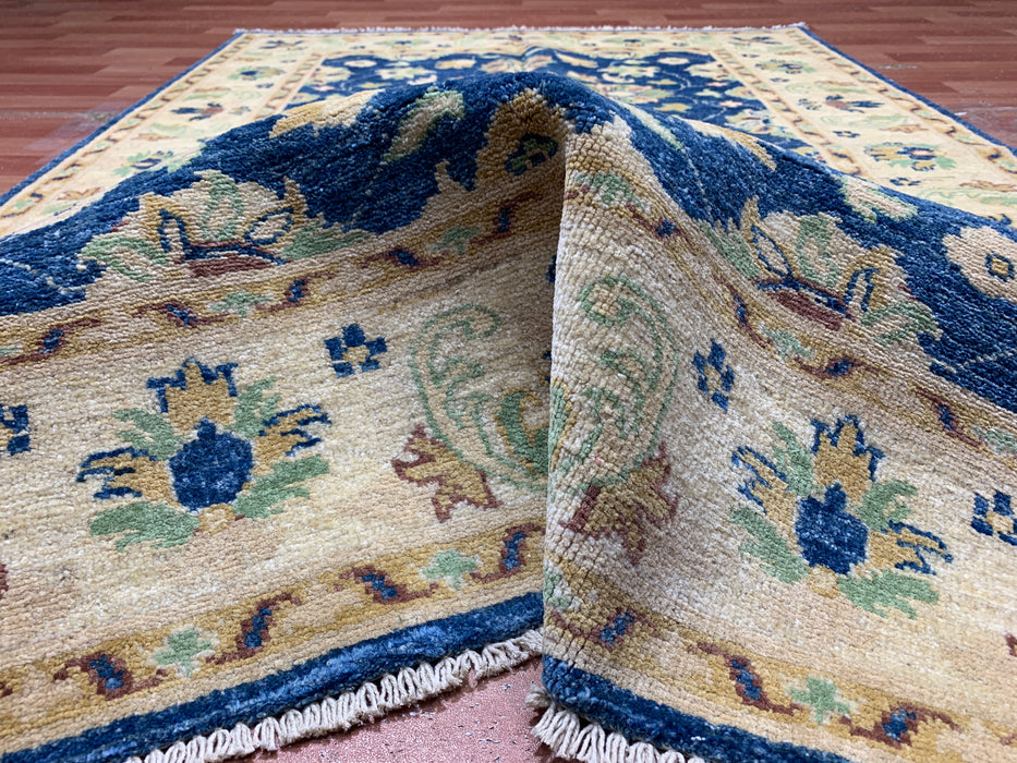 5'7" × 7'8" Hand-Knotted Ziegler Wool Rug – Black with Blue & Gold Floral Border