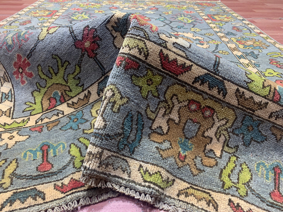 4'10" × 6'8" Hand-Knotted Ziegler Wool Rug – Soft Blue with Multicolor Floral Motifs