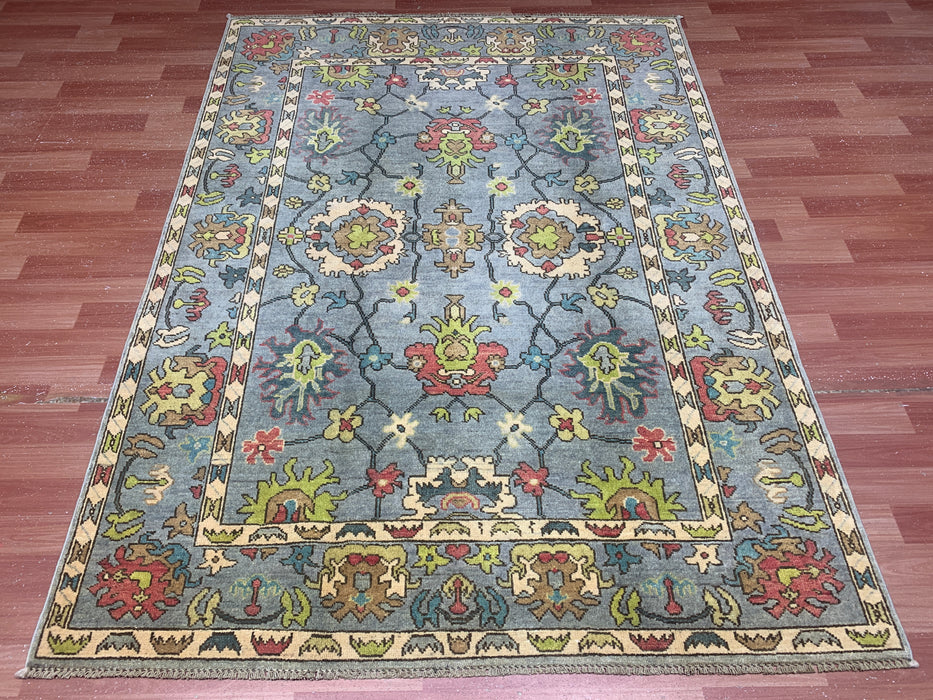 4'10" × 6'8" Hand-Knotted Ziegler Wool Rug – Soft Blue with Multicolor Floral Motifs