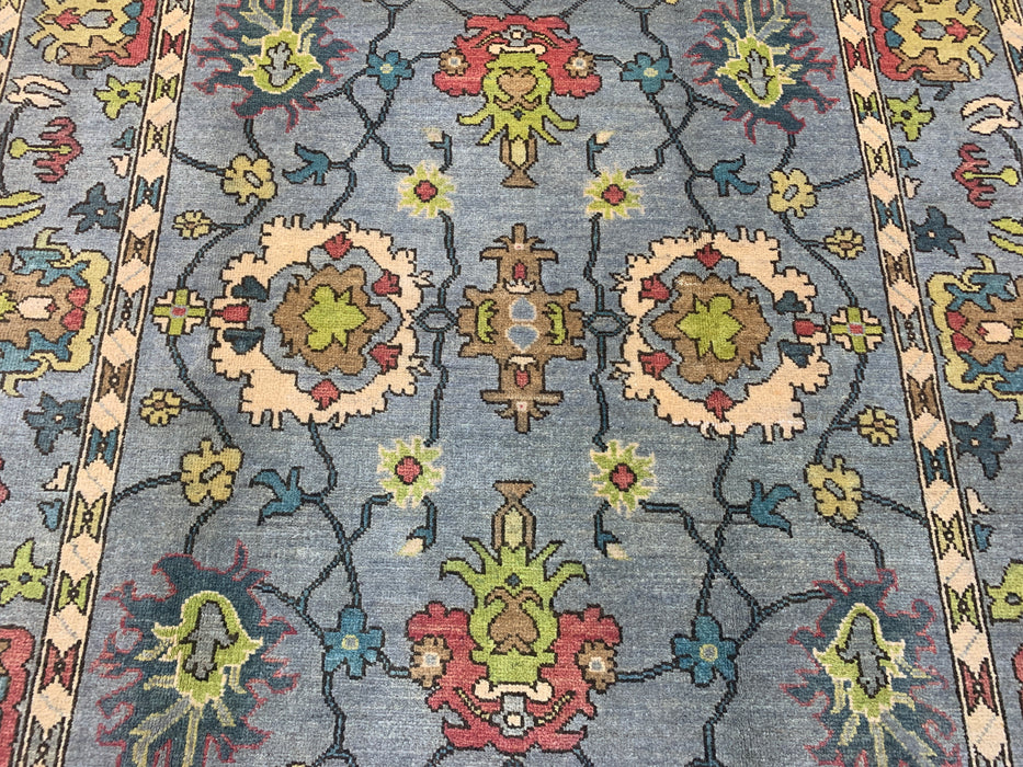 4'10" × 6'8" Hand-Knotted Ziegler Wool Rug – Soft Blue with Multicolor Floral Motifs