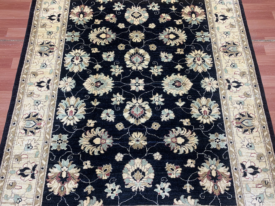 4'11" × 6'3" Hand-Knotted Ziegler Wool Rug – Black with Ivory Floral Border