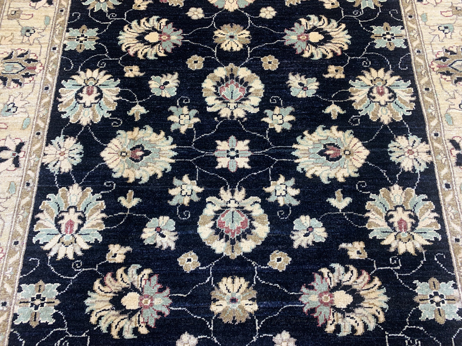 4'11" × 6'3" Hand-Knotted Ziegler Wool Rug – Black with Ivory Floral Border