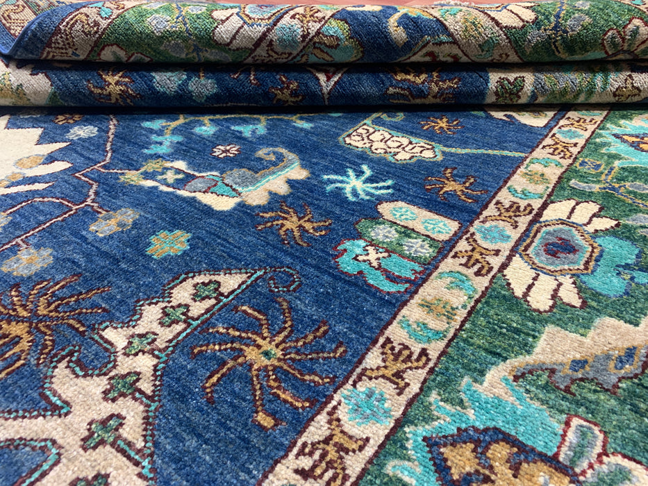 5'0" × 7'10" Hand-Knotted Tribal Wool Rug – Navy Blue with Green & Ivory Border