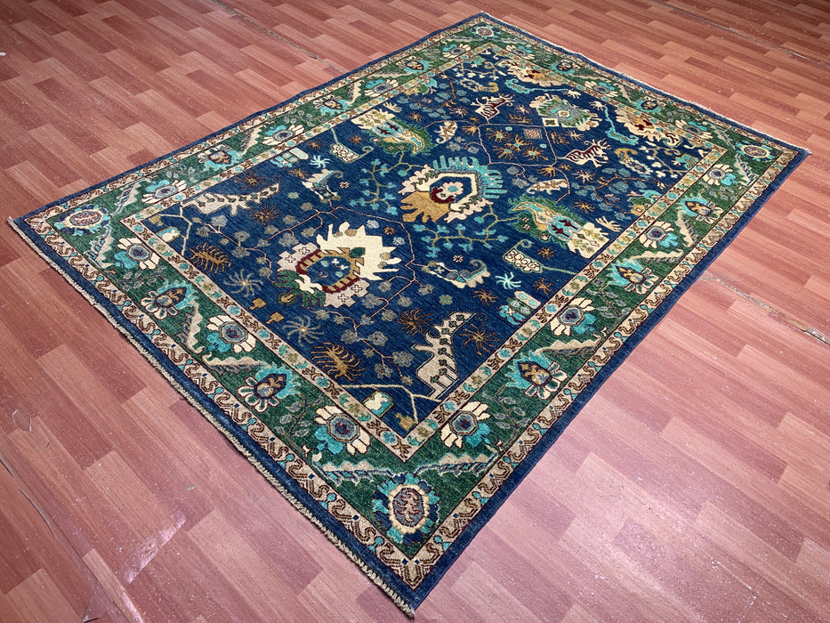 5'0" × 7'10" Hand-Knotted Tribal Wool Rug – Navy Blue with Green & Ivory Border