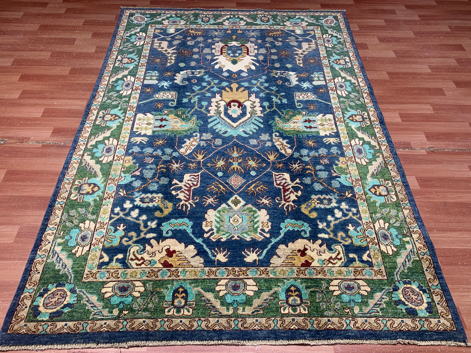 5'0" × 7'10" Hand-Knotted Tribal Wool Rug – Navy Blue with Green & Ivory Border