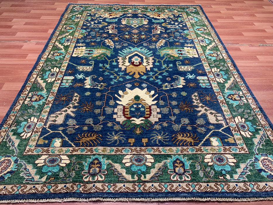 5'0" × 7'10" Hand-Knotted Tribal Wool Rug – Navy Blue with Green & Ivory Border