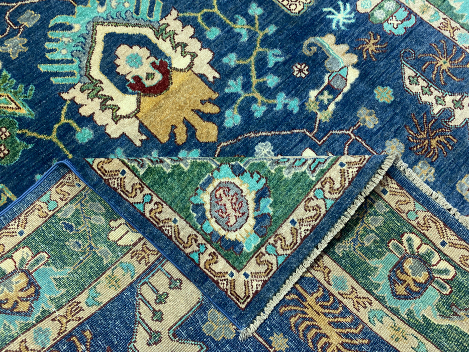 5'0" × 7'10" Hand-Knotted Tribal Wool Rug – Navy Blue with Green & Ivory Border