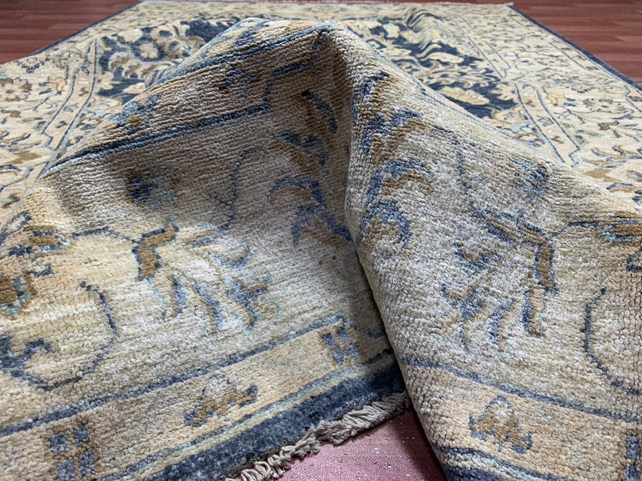 4'10" × 7'3" Hand-Knotted Wool Rug – Navy & Beige with Floral Medallion Design