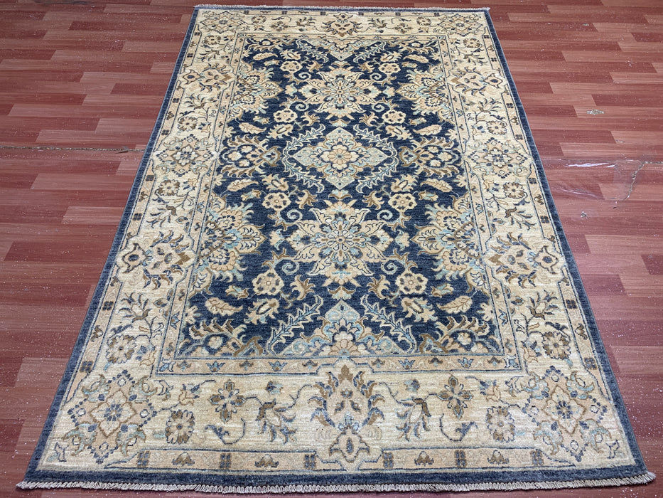 4'10" × 7'3" Hand-Knotted Wool Rug – Navy & Beige with Floral Medallion Design