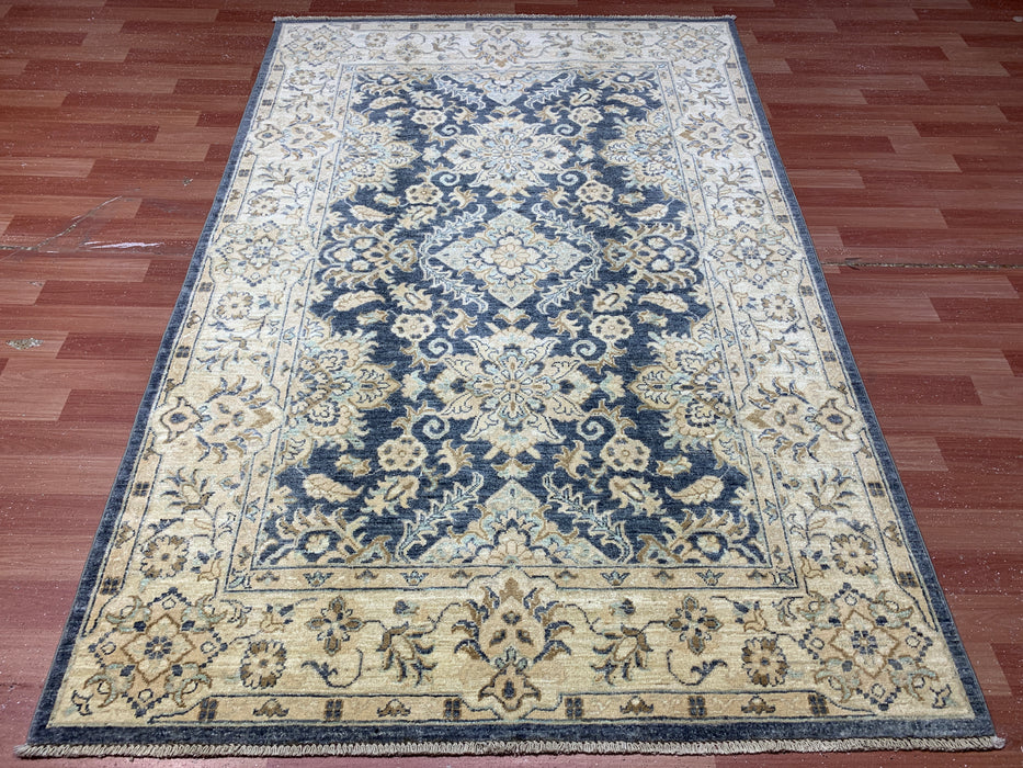 4'10" × 7'3" Hand-Knotted Wool Rug – Navy & Beige with Floral Medallion Design