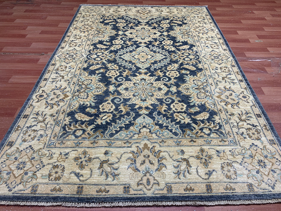 4'10" × 7'3" Hand-Knotted Wool Rug – Navy & Beige with Floral Medallion Design