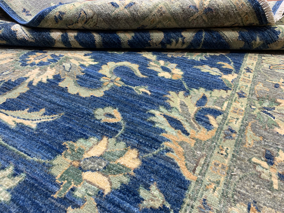 4'10" × 6'6" Hand-Knotted Wool Rug – Navy with Soft Beige & Sage Floral Border