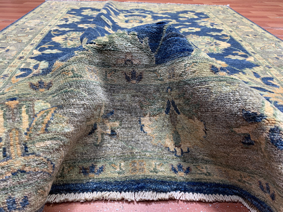 4'10" × 6'6" Hand-Knotted Wool Rug – Navy with Soft Beige & Sage Floral Border