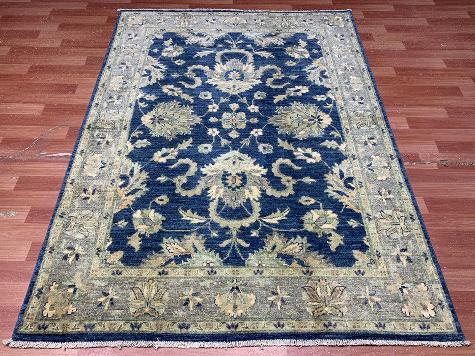 4'10" × 6'6" Hand-Knotted Wool Rug – Navy with Soft Beige & Sage Floral Border