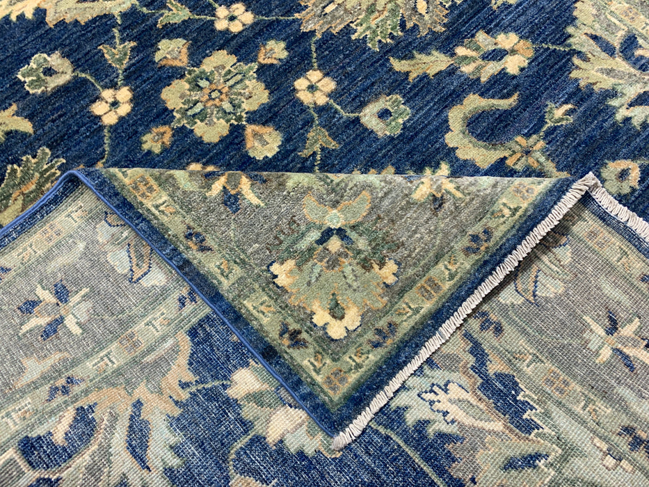 4'10" × 6'6" Hand-Knotted Wool Rug – Navy with Soft Beige & Sage Floral Border