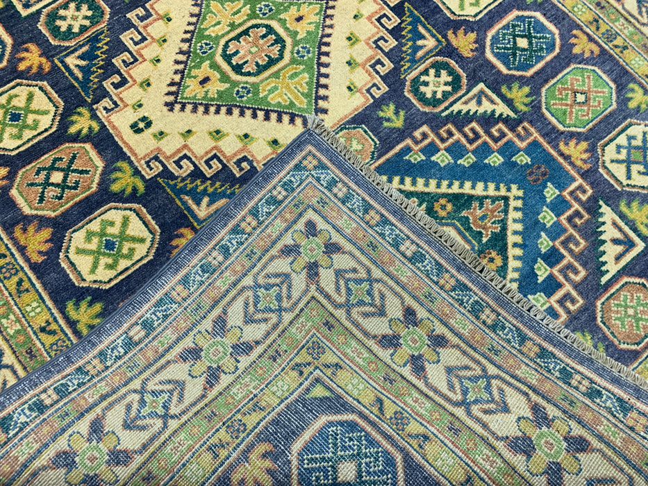 4'11" × 6'10" Hand-Knotted Wool Rug – Navy & Green Geometric Tribal Design