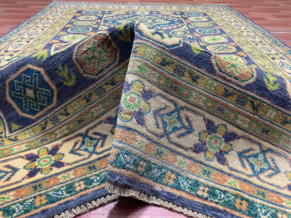 4'11" × 6'10" Hand-Knotted Wool Rug – Navy & Green Geometric Tribal Design