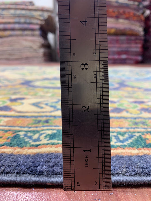 4'11" × 6'10" Hand-Knotted Wool Rug – Navy & Green Geometric Tribal Design