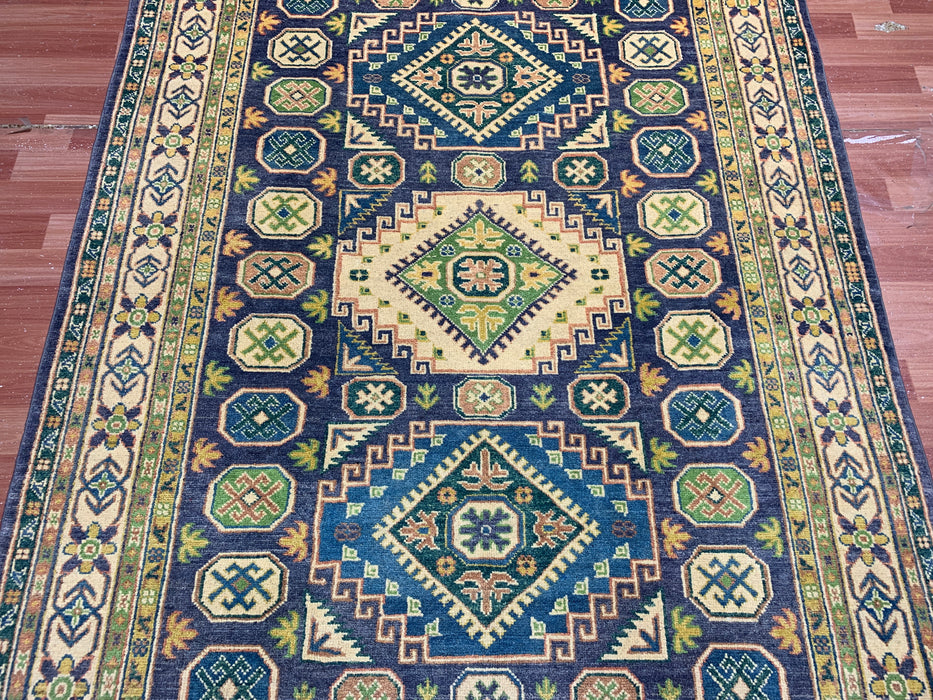 4'11" × 6'10" Hand-Knotted Wool Rug – Navy & Green Geometric Tribal Design