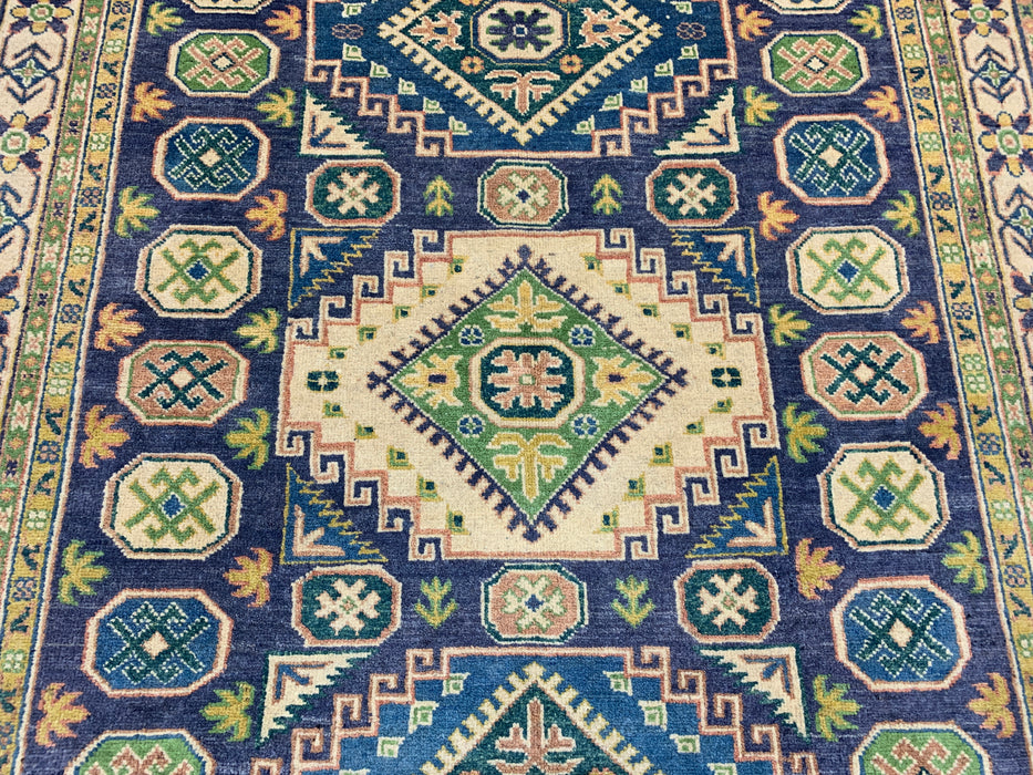 4'11" × 6'10" Hand-Knotted Wool Rug – Navy & Green Geometric Tribal Design