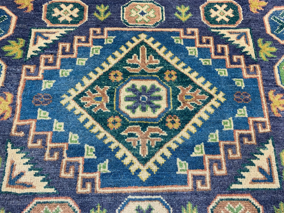 4'11" × 6'10" Hand-Knotted Wool Rug – Navy & Green Geometric Tribal Design